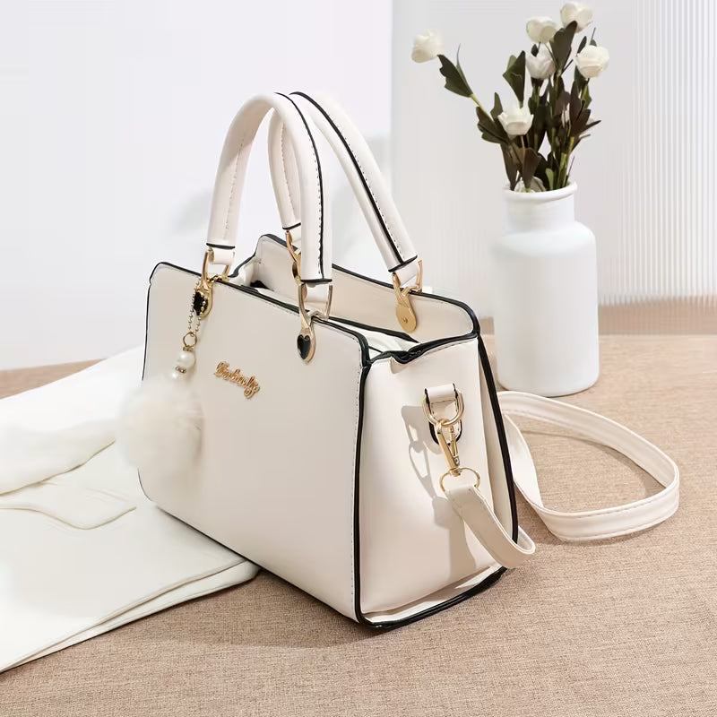 Sanika - Bolso de Mano Con Colgante de Pompón y Correa Para el Hombro