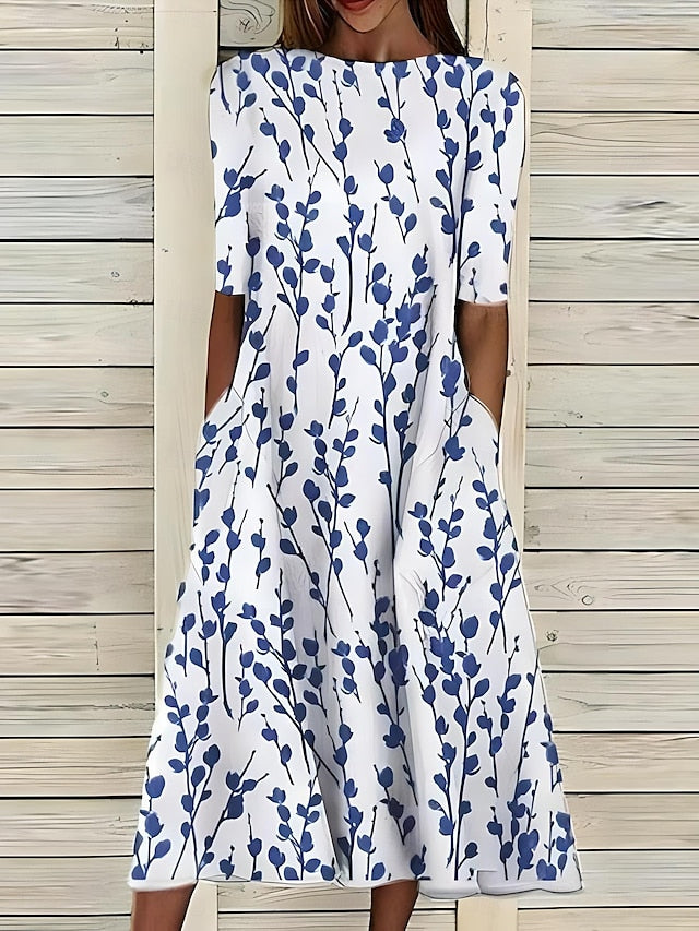 Kwanza - Vestido Midi Holgado Con Estampado Floral
