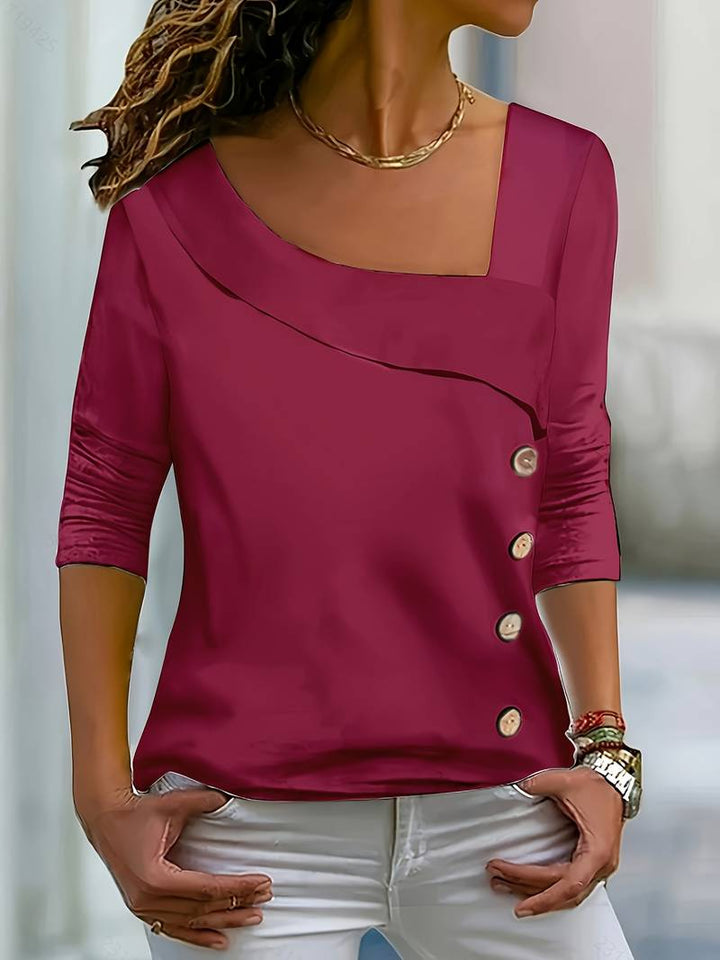 Chelsey - Camiseta Con Cuello Asimétrico y Dotones Decorativos