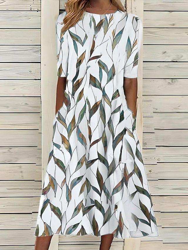 Kwanza - Vestido Midi Holgado Con Estampado Floral